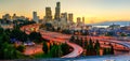 Panorama downtown Seattle and light trails on I-90, I-5 highway Royalty Free Stock Photo