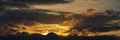 Panoramic view of dramatic clouds rising of sun floating in sky to change weather. Soft focus, blurred motion. Natural Royalty Free Stock Photo