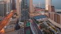 Panoramic view of the Dubai Marina and JBR area and the famous Ferris Wheel aerial night to day Royalty Free Stock Photo