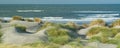 Panoramic view with dunes, beach and North Sea waves Royalty Free Stock Photo