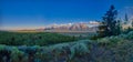 Panoramic view of early sun rays on the Grand Teton mountain range