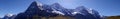 Panoramic view of Eiger Monch and Jungfrau Mountains in Swiss Alps Royalty Free Stock Photo