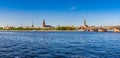 Panoramic view on embankment of Daugava River, Riga, Latvia. Royalty Free Stock Photo