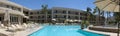 Panoramic view of an almost empty pool area of a hotel in Indian Wells