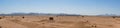 Panoramic view of the endless desert and high mountains against the backdrop of the blue sky. Safaga, Egypt Royalty Free Stock Photo