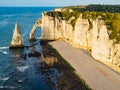 Panoramic view of Etretat coastline, vertical chalk cliffs with impressive arch and pinnacle Royalty Free Stock Photo