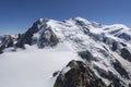 A panoramic view of European Alps on a sunny day. Mount Blanc as a highest mountain in Europe covered with snow and glacier Royalty Free Stock Photo