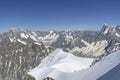 A panoramic view of European Alps on a sunny day. Mount Blanc as a highest mountain in Europe covered with snow and glacier. Royalty Free Stock Photo