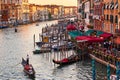 Panoramic view of famous Canal Grande from famous Rialto Bridge at sunset in Venice. Royalty Free Stock Photo