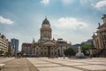 Panoramic view of famous Gendarmenmarkt square with Berlin Concert Hall and German Cathedral in golden evening light at sunset Royalty Free Stock Photo