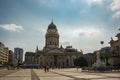 Panoramic view of famous Gendarmenmarkt square with Berlin Concert Hall and German Cathedral in golden evening light at sunset