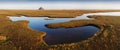 Panoramic view of famous historic Le Mont Saint-Michel tidal island on a sunny day with blue sky and clouds in summer, Normandy. Royalty Free Stock Photo