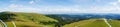 Panoramic view from the Feldberg tower down into the valley. Feldberg is the highest mountain in the Black Forest. Germany Royalty Free Stock Photo
