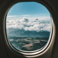 Panoramic view of fields and clouds from airplane window Royalty Free Stock Photo