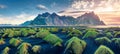 Panoramic view from flying drone of black sand dunes on Stokksnes cape with Vestrahorn Batman Mountain on background. Impressive Royalty Free Stock Photo