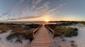 Panoramic view of a footbridge leading to Smathers Beach, bathed in the morning light. Ai Generated