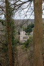 Panoramic view from the forest hill of the St Andrew`s Church in Castle Combe, Chippenham Royalty Free Stock Photo