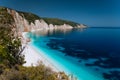 Panoramic view of Fteri beach, blue lagoon with rocky coastline, Kefalonia, Greece. Calm clear blue emerald green