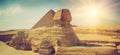 Panoramic view of the full profile of the Great Sphinx with the pyramid in the background in Giza. Egypt.