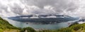 Panoramic view of Gastineau Channel, port of Juneau and mountains covered with clouds from the top of mountain Roberts in Alaska Royalty Free Stock Photo