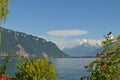 Panoramic view on Geneva Lake. Mountains, hills, greenery and blue sky. Switzerland Royalty Free Stock Photo