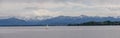 Panoramic view of German lake `Starnberger See` with beautiful alp mountains