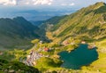 Panoramic view of glacial Lake Balea with Transfagarasan road in most famous place of Romania Royalty Free Stock Photo