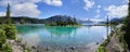 Panoramic view of glacial mountain Garibaldi lake with turquoise water on sunny summer day.islands with firs in the middle of the Royalty Free Stock Photo