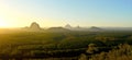 Panoramic view of Glass House Mountains at sunset in Queensland, Australia. Royalty Free Stock Photo