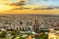 Panoramic view of golden sunset in city Belo Horizonte , Brazil .