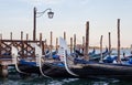 Panoramic view of gondolas at sunset, traditional on Grand Canal with San Giorgio Maggiore church. San Marco, Venice - Italy