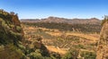 Panoramic view of the gorge - a channel of the Guadelevin River, the valley and mountains from the New Roman Bridge. Ronda, Spain