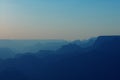 Panoramic View of Grand Canyon in blue colors after sunset Royalty Free Stock Photo