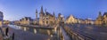 Panoramic view of the Graslei, quay in the promenade next to river Lys in Ghent, Belgium and St Michael`s Bridge at dusk.