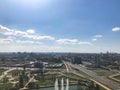 Panoramic view from a great height on a beautiful green city with many roads and high-rise buildings. Royalty Free Stock Photo