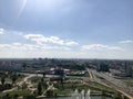 Panoramic view from a great height on a beautiful green city with many roads and high-rise buildings, buildings. View of the city Royalty Free Stock Photo
