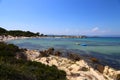 Panoramic view of the Greek rocky beach on a sunny day