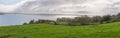 Panoramic view of green grassy coast near Dunkineely County, Donegal, Ireland, Atlantic Ocean Royalty Free Stock Photo