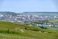 Panoramic view on green premier cru champagne vineyards and Epernay, Champange, France