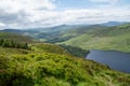 Panoramic view of  The Guinness Lake Lough Tay -  a movie and series location, such as Vikings. Close to Dunlin City Royalty Free Stock Photo