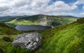 Panoramic view of  The Guinness Lake Lough Tay -  a movie and series location, such as Vikings. Close to Dunlin City Royalty Free Stock Photo
