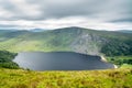 Panoramic view of The Guinness Lake Lough Tay -  a movie and series location, such as Vikings. Close to Dunlin City, popular Royalty Free Stock Photo