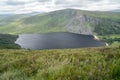 Panoramic view of  The Guinness Lake Lough Tay -  a movie and series location, such as Vikings. Close to Dunlin City, Royalty Free Stock Photo