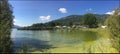 Panoramic view of the gulf of Agno and a campsite in Switzerland