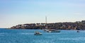 Panoramic view of harbor and exclusive residential peninsula along Plage del la Salis beach in Antibes city in France