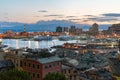 Panoramic view of the harbor of Genoa with Lanterna lighthouse in the background at the dusk. Liguria, Italy Royalty Free Stock Photo