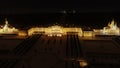 A panoramic view from a height of the Grand Palace and the upper garden in Peterhof in winter, the facade is illuminated at night Royalty Free Stock Photo