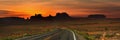 Panoramic view of highway to Monument valley Royalty Free Stock Photo