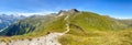 Panoramic view of a hiking trail through the Austrian Alps in the high mountains of the Zillertal near the Tux Glacier in summer,