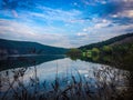 Panoramic view from the hill on bend of the river. Beautiful summer landscape. Colorful clouds of the morning sky. Dniester Canyon Royalty Free Stock Photo